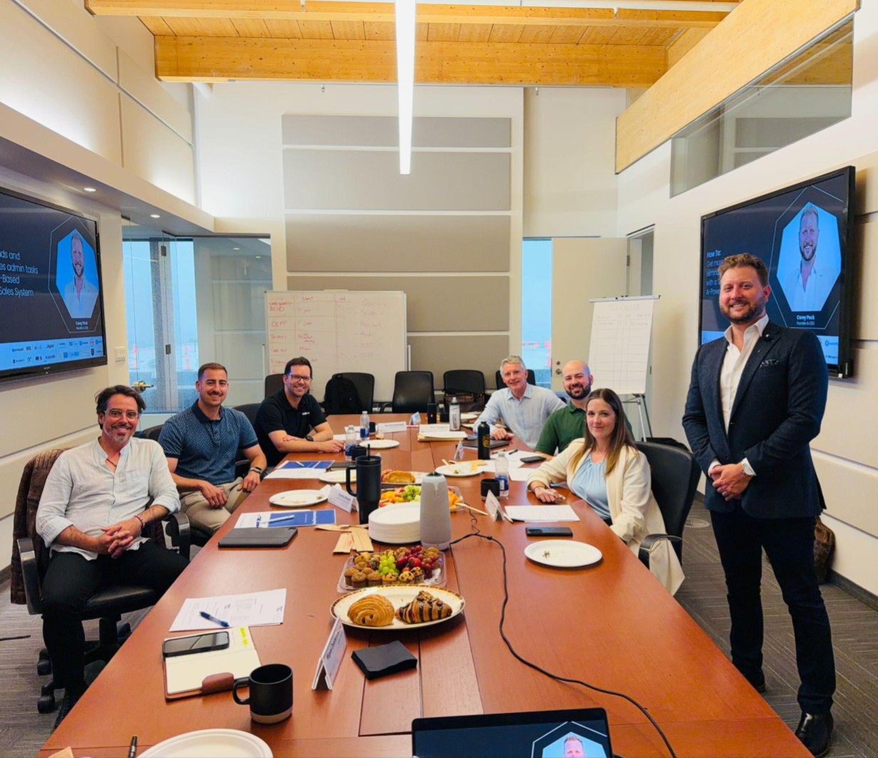 Corey Peck leading a boardroom session on AI-powered sales systems