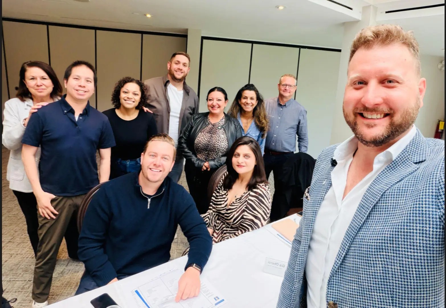 Corey Peck with a leadership team at an offsite working session