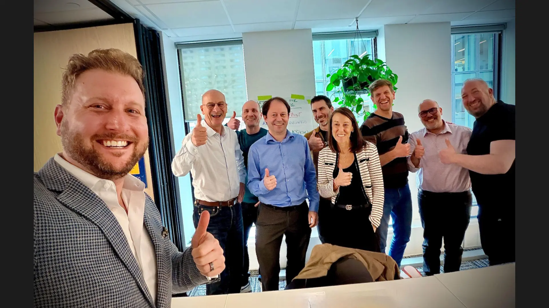 Corey Peck with an executive workshop group after a live training session
